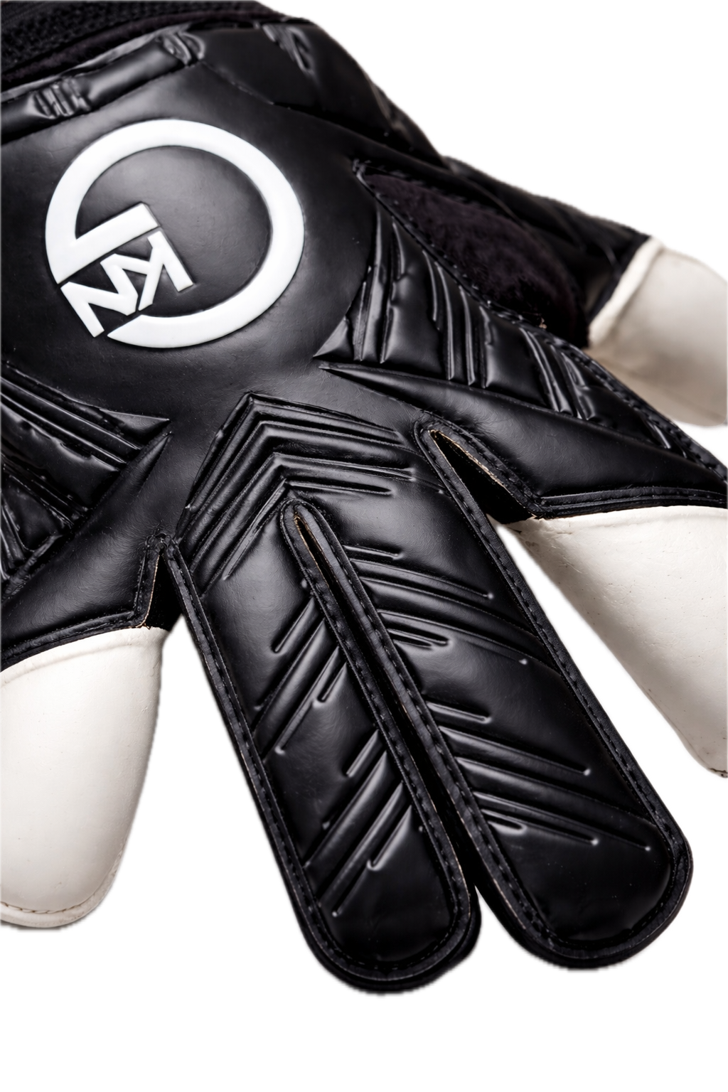 GKN goalkeeper gloves black backhand close-up showing embossed latex detailing and white palm material